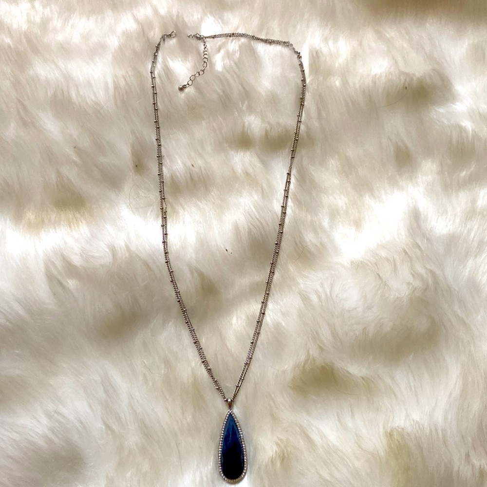 Longer style necklace with blue and sparkly stones pendant